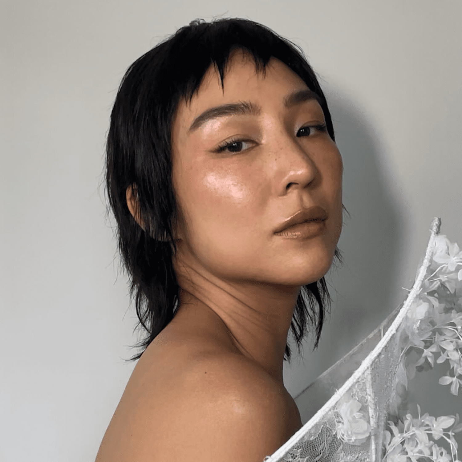 Greta Lee attends the Met Gala with a choppy mullet
