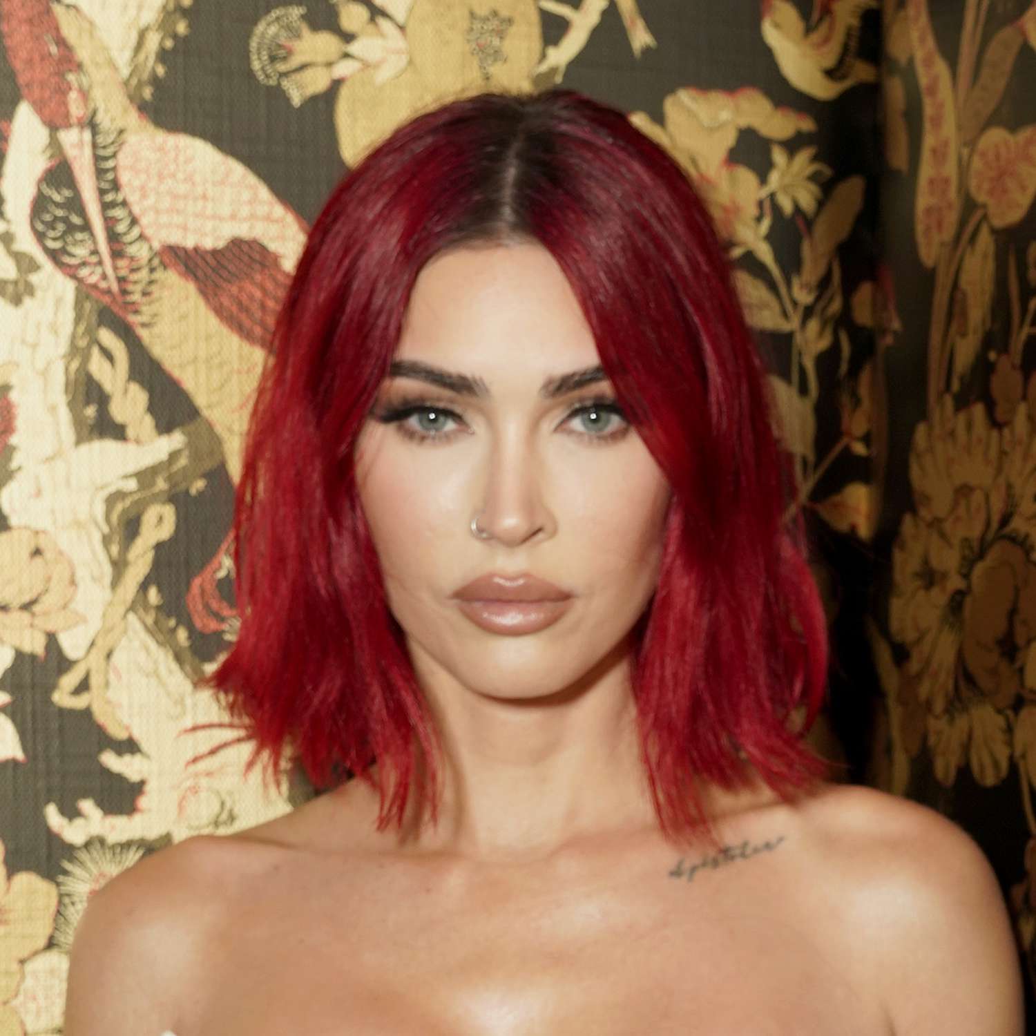 Megan Fox attends a GQ event in a bright red a-line haircut