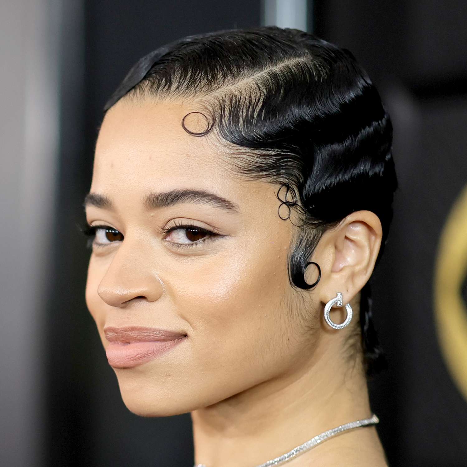 Ella Mai attends the Grammys with a 1920s styled pixie