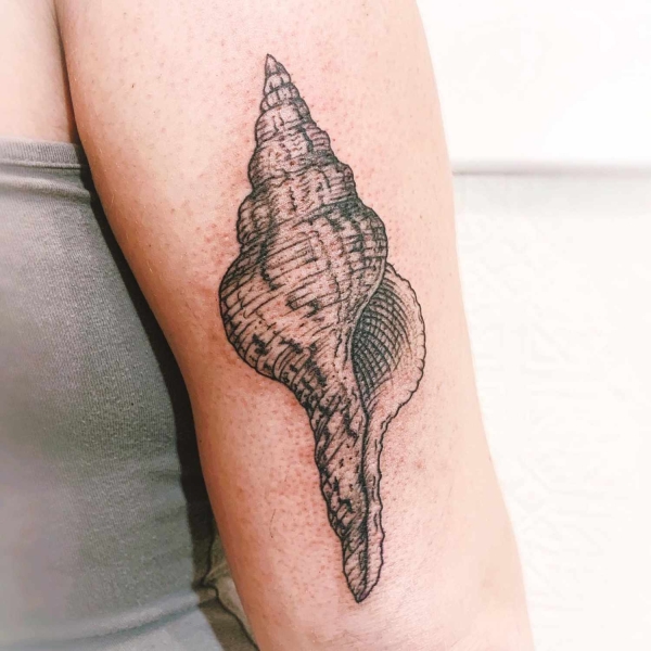 Considering a Fine Line Tattoo? Here's What to Know Before Getting One